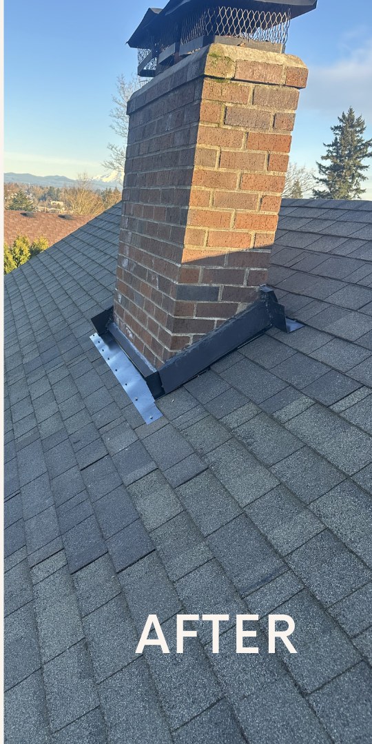 Brick chimney with new metal step and counter flashing and finished shingles